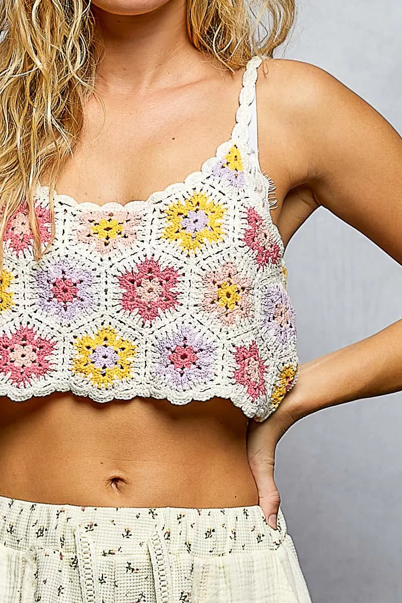 Boho crochet crop top with colorful floral patterns, perfect for trendy, happy summer vibes