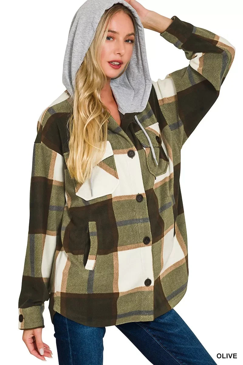 Olive plaid hooded shirt jacket with cozy gray hood, button front, and pockets — trendy, comfy, and stylish.