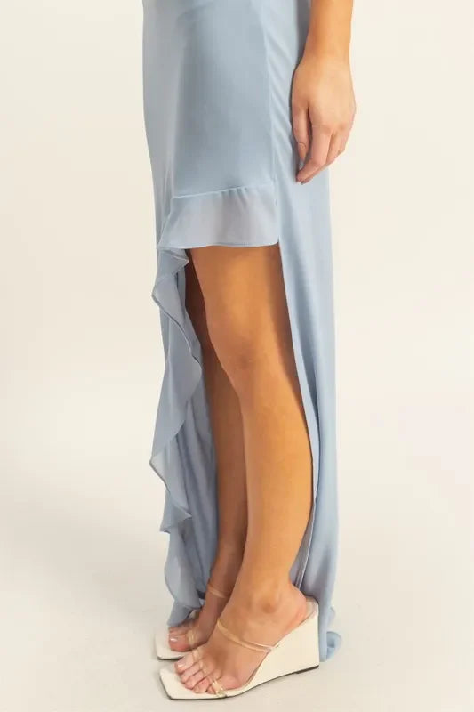 Light blue ruffled maxi dress with high slit, paired with white wedge sandals — trendy, affordable, and perfect for happy summer days.