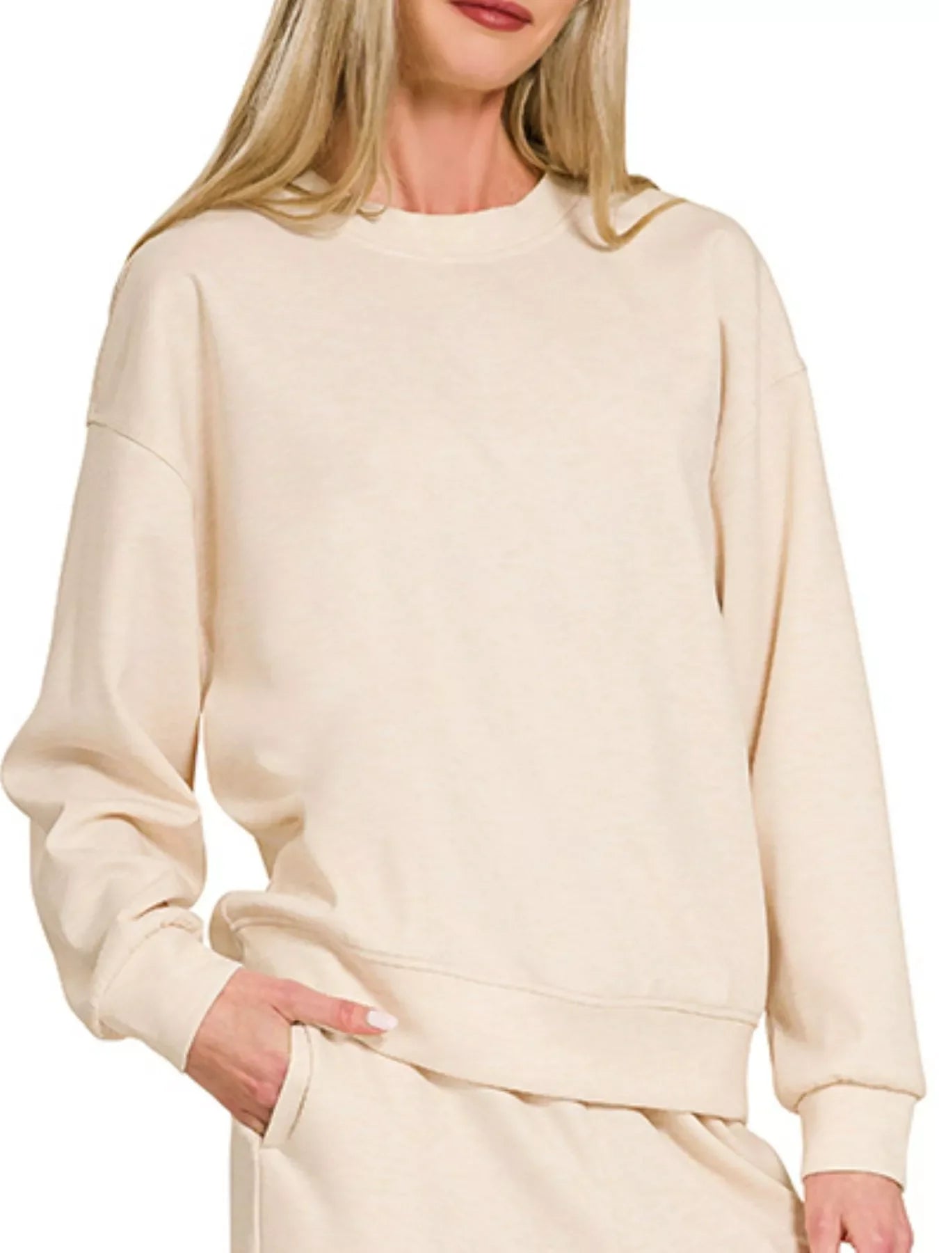 Cream oversized sweatshirt with cozy fit, perfect for trendy, comfortable loungewear