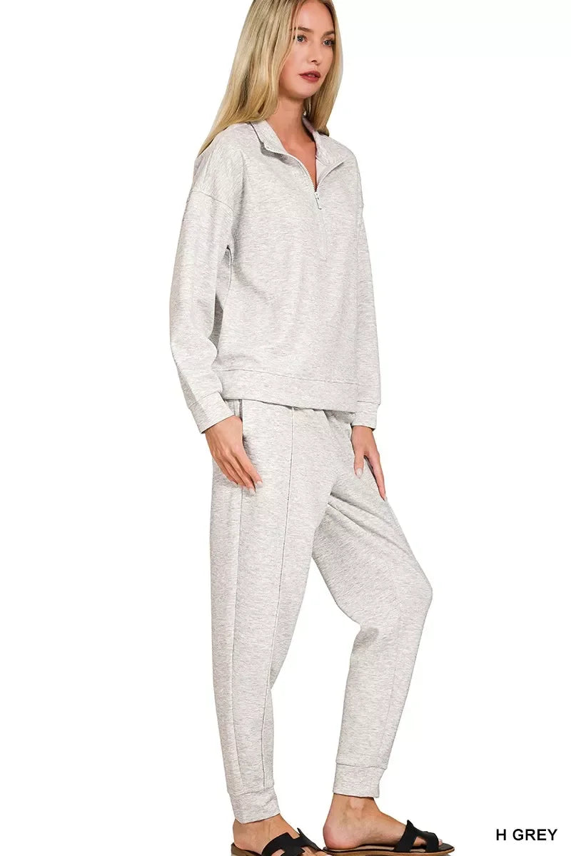 Heather grey cozy lounge set with quarter zip top and jogger pants, perfect for relaxed days.